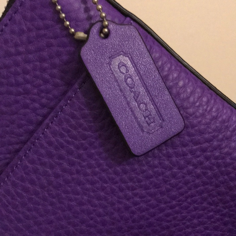 Brand new without tags small purple Coach purse